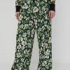 Γυναικεία Υφασμάτινα Παντελόνι Puma Puma X Liberty χρώμα: πράσινο